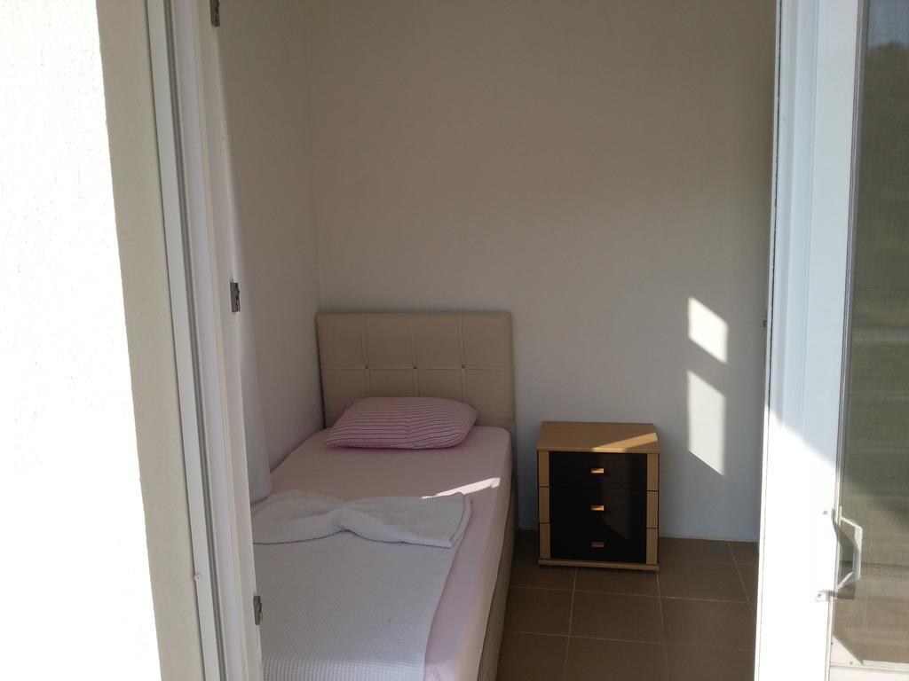 Doa Apartments คูซาดาซี ภายนอก รูปภาพ
